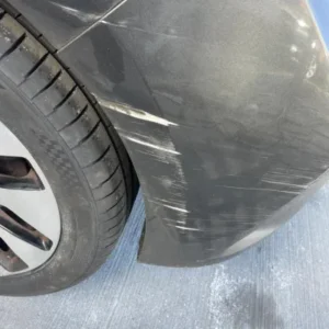Scuff on the bumper of a car
