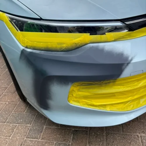 bumper-dent-being repaired