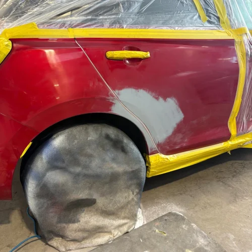 scratch repair during on red suzuki swift.webp